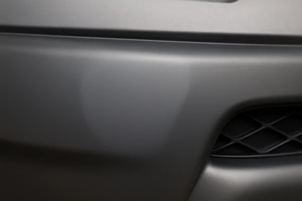 repaired plastic car bumper section