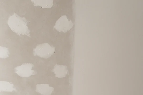 ceiling surface before and after sanding