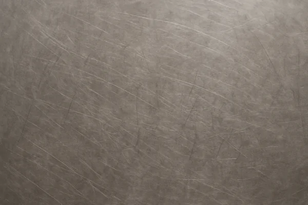 dull stainless steel surface showing scratches